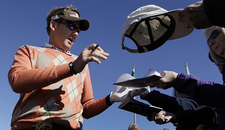 Ian Poulter signs autographs Monday at the Ritz-Carlton Club in Marana, Ariz., site of this week's WGC-Accenture Match Play Championship.
