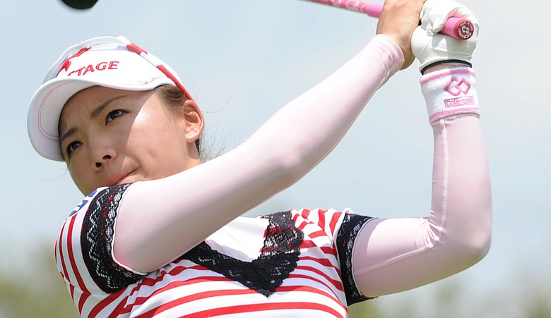 Chie Arimura tees off on the 12th hole during the first round of the HSBC Women's Champions in Singapore.