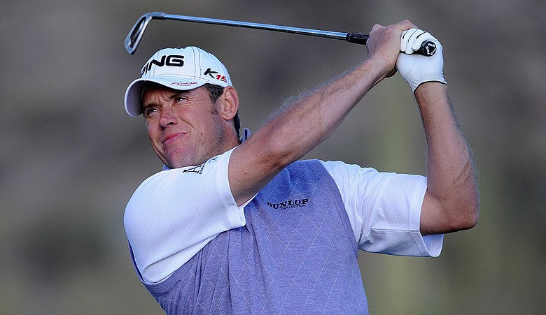 Lee Westwood plays his tee shot on the 16th hole during the first round of the WGC-Accenture Match Play Championship.