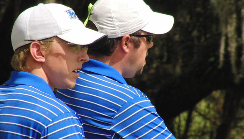 Middle Tennessee's Hunter Green (left) talks with assistant coach Kent Bulle.