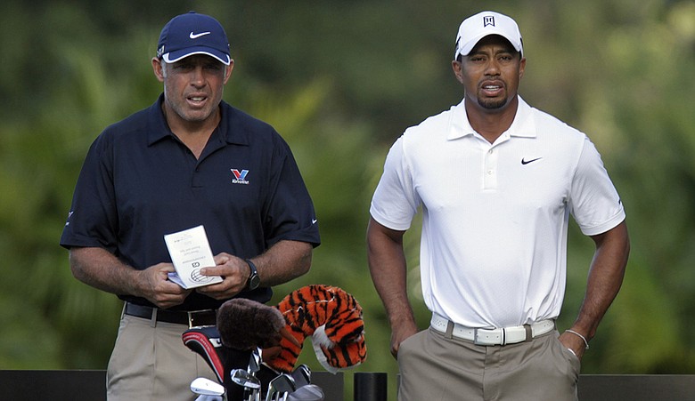 Tiger Woods (right) and caddie Steve Williams during a practice round for the WGC-Cadillac Championship.