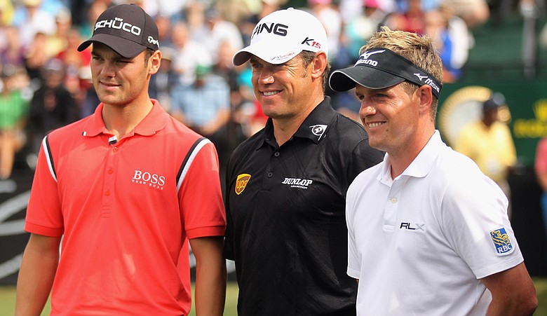 Martin Kaymer, left, Lee Westwood, center, and Luke Donald, the top-ranked players in the world, pose on the first tee during the first round of the 2011 WGC-Cadillac Championship.