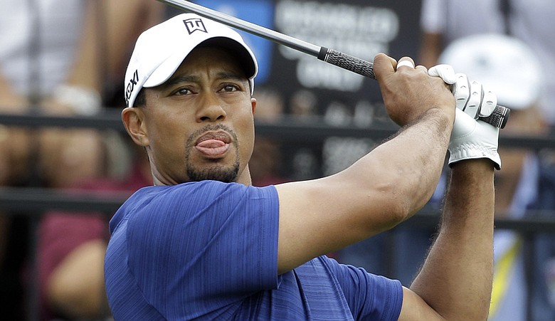 Tiger Woods tees off at the Doral's tenth during Round 1 of the WGC Cadillac Championship.