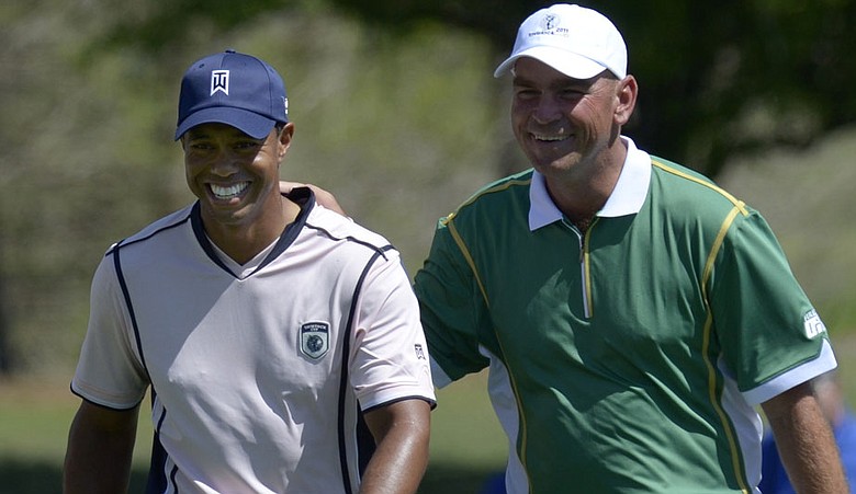 Tiger Woods and Thomas Bjorn during Day 1 of the Tavistock Cup.