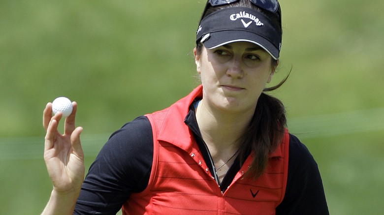 Sandra Gal, of Germany, makes par on the first hole in the final round of the LPGA Kia Classic golf tournament at Industry Hills Golf Club in Industry, Calif., Sunday, March 27, 2011.