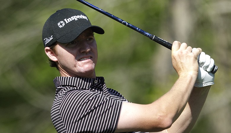 Jimmy Walker watches his tee shot on the second hole during the first round of the Houston Open on Thursday, March 31, 2011, in Humble, Texas.