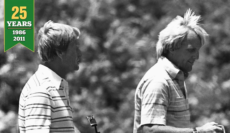 Jack Nicklaus, left, and Greg Norman carry their putters as they leave the green during practice round on June 11, 1986 at the U.S. Open in Southampton, New York. Norman was the runner-up to Nicklaus' in this year's Masters tournament.
