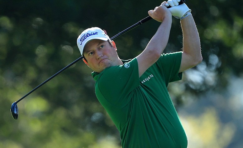 Tim Clark of South Africa watches his tee shot on the fourth hole during the first round of the 2011 Masters Tournament at Augusta National Golf Club on April 7, 2011 in Augusta, Georgia.