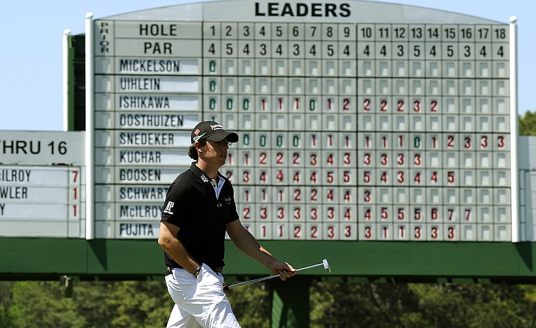 Rory McIlroy, seen here on No. 17, shot 65 to take the early first-round lead at the Masters.