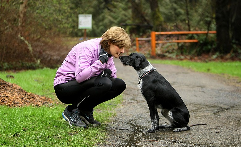 Nike's Cindy Davis and her puppy before a long run in Oregon.