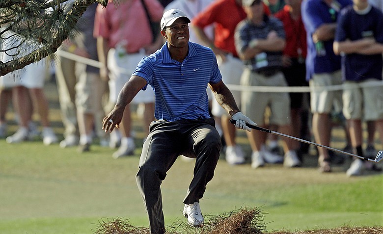 Tiger Woods suffered a MCL sprain in his left knee during this shot in the third round of the 2011 Masters.