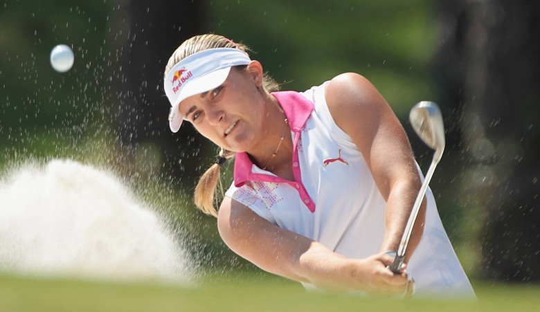 Alexis Thompson watches a bunker shot on the 16th hole during the third round of the 2011 Avnet LPGA Classic.