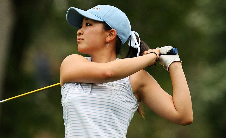 UCLA's Tiffany Lua hits her tee shot at No. 9. Lua made a hole-in-one at No. 11.