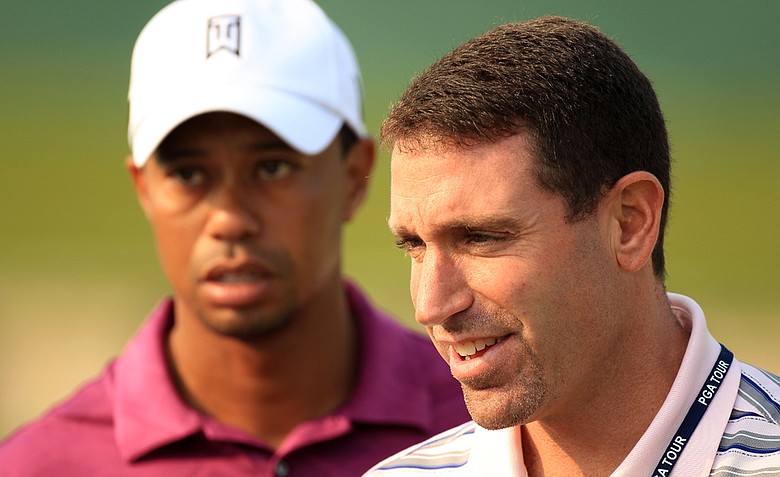 Tiger Woods, left, and agent Mark Steinberg