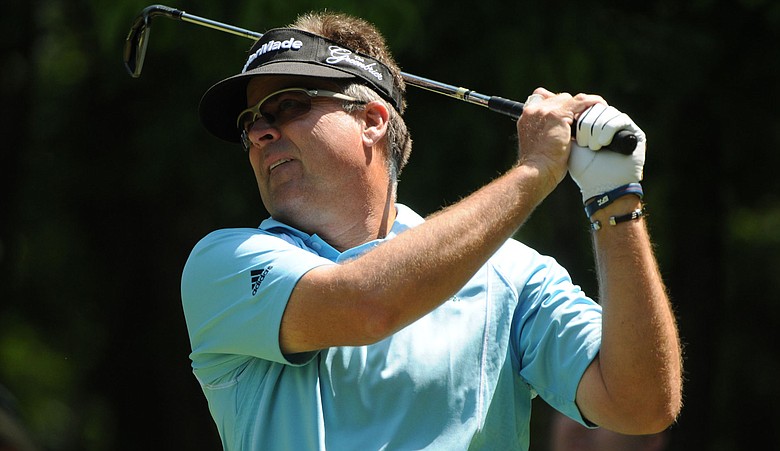 Kenny Perry watches his drive on the seventh hole during the second round of the Regions Tradition golf tournament at Shoal Creek.