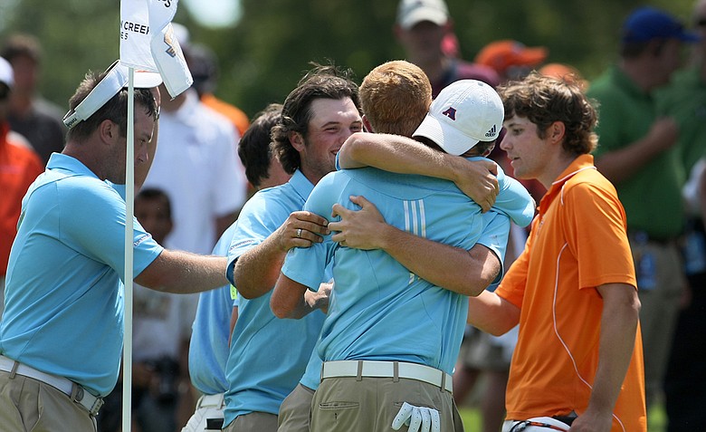 Augusta State celebrates after defeating Oklahoma State during Semifinals of Saturday's Match Play at the 2011 NCAA Division I Men's Golf Championship at Karsten Creek in Stillwater, Oklahoma.-