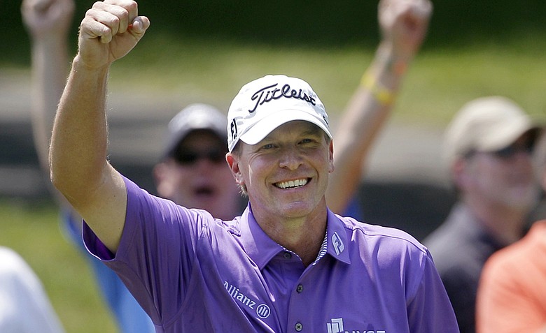 Steve Stricker celebrates after holing out a shot from the fairway for an eagle on the second hole during the third round of the Memorial golf tournament at Muirfield Village Golf Club, Saturday, June 4, 2011, in Dublin, Ohio.