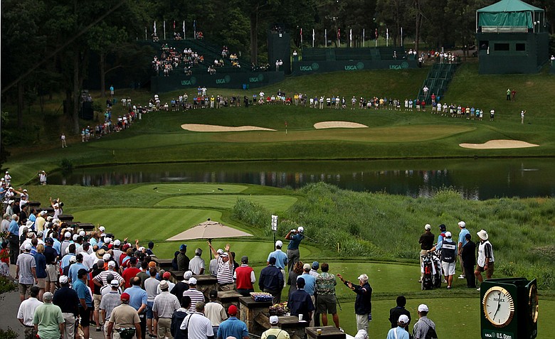 Marc Turnesa hits his tee shot on the tenth hole during the first round of the 111th U.S. Open at Congressional Country Club.
