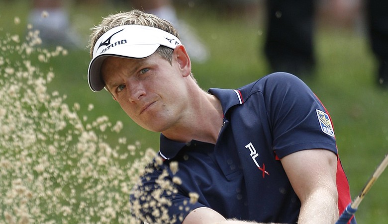 Luke Donald blasts out of the sand during Round 1 of the U.S. Open.