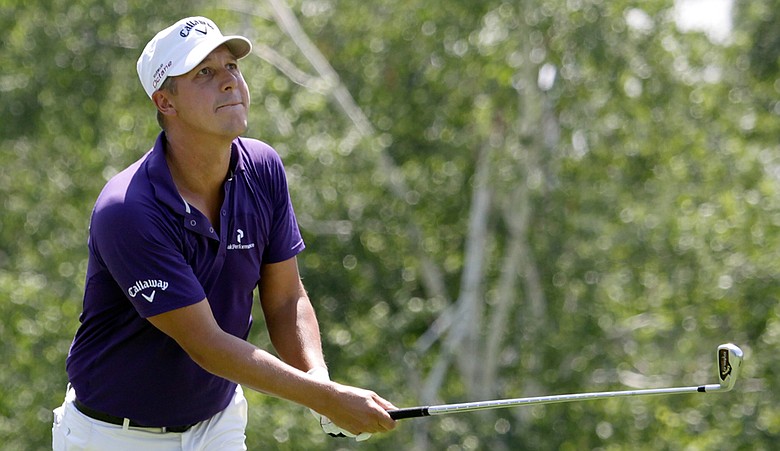 Fredrik Jacobson watches his shot during Round 3 of the Travelers Championship at TPC River Highlands.