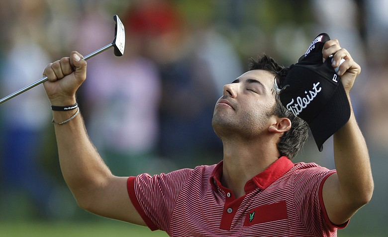 Pablo Larrazabal of Spain celebrates after winning the BMW International Open 2011 golf tournament in Eichenried near Munich, southern Germany, on Sunday, June 26, 2011.
