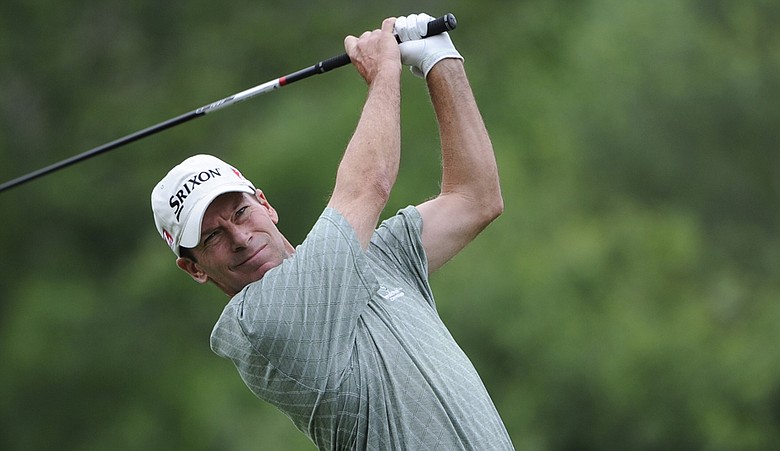 John Huston tees off on the ninth hole during the final round of the Dick’s Sporting Goods Open.