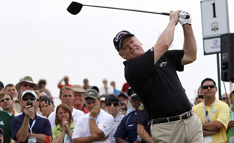 Johnny Miller tees off on one during the Champions for Change Golf Challenge at Harbor Shores Golf Club in Benton Harbor, Mich., on Tuesday Aug. 10, 2010.