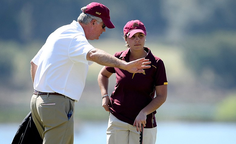 John Harris (left) and Minnesota's Teresa Puga during the 2011 UCF Challenge