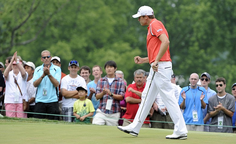 Nick Watney pumps his fist after making a putt on the fourth hole in the final round of the AT&T National golf tournament at Aronimink Golf Club, Sunday, July 3, 2011, in Newtown Square, Pa.