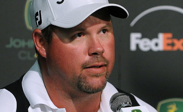Kris Blanks appears at a news conference following his 8-under round at the John Deere Classic golf tournament at TPC Deere Run in Silvis, Ill., on Thursday, July 7, 2011.