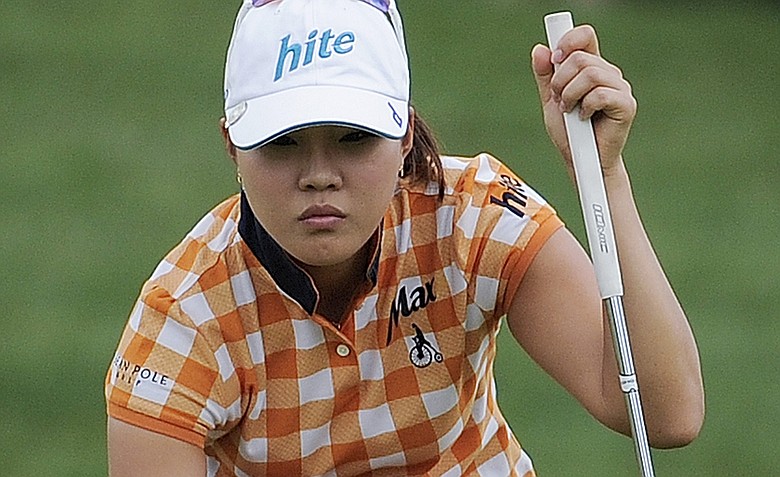 Hee Kyung Seo of South Korea lines up a putt on the 10th green during the fourth round of the Women's U.S. Open golf tournament at the Broadmoor Golf Club on Sunday, July 10, 2011, in Colorado Springs, Colo.