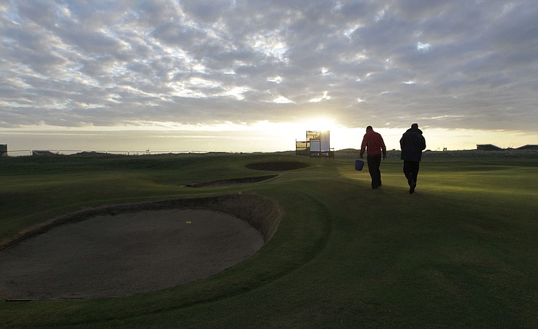 Workers prepare Royal St. George's to host the 2011 British Open.