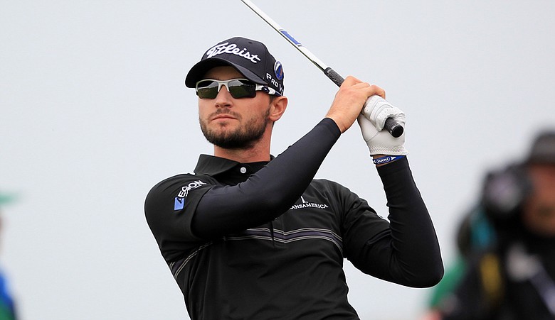 Kyle Stanley plays a shot on the 18th fairway during the first round of the 140th British Open.