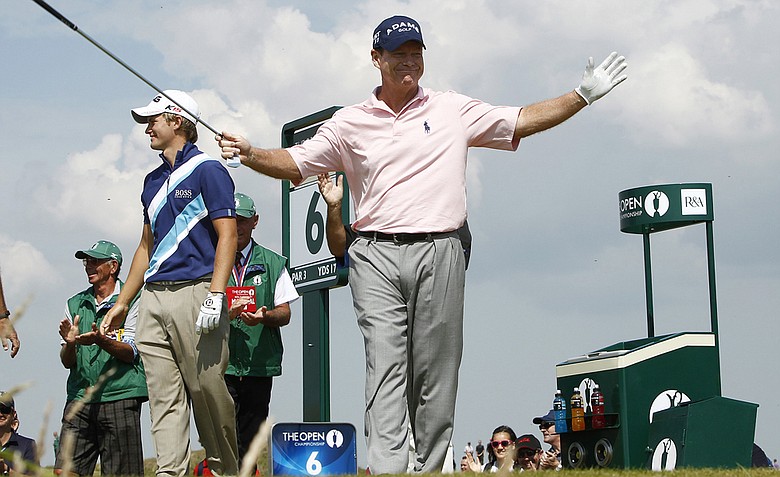 Tom Watson of the US reacts at the 6th tee after his hole in one during the second day of the British Open Golf Championship at Royal St George's golf course Sandwich, England, Friday, July 15, 2011.