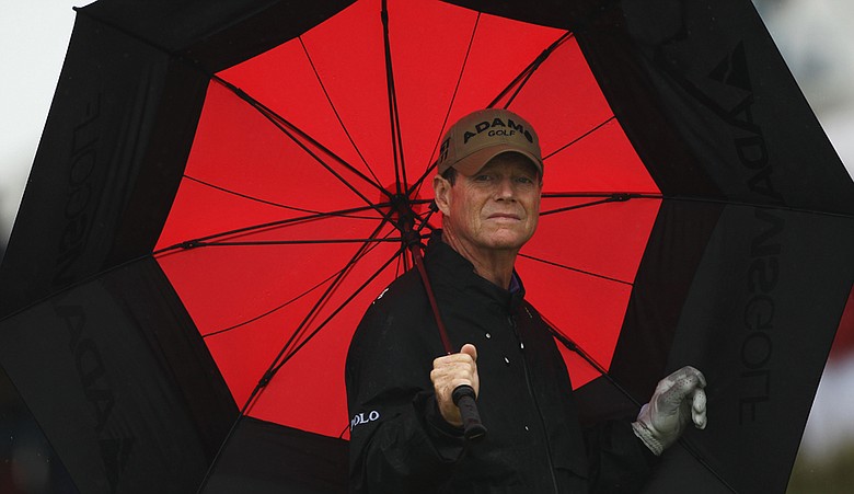 Tom Watson put up a 2-over 72 in hard rain and high winds.
