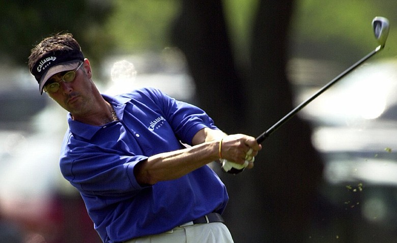 Jeff Julian, from Norwich, VT, takes a shot down the 9th fairway on the second day of the Greater Hartford Open in Cromwell, Conn., Friday, June 21, 2002. Julian had Amyotrophic Lateral Scierosis, also known as Lou Gehrigs disease.