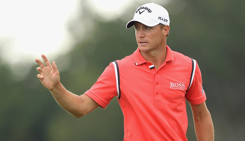 Alexander Noren celebrates during the third round of the 2011 Nordea Scandinavian Masters at Bro Hof Slott Golf Course.