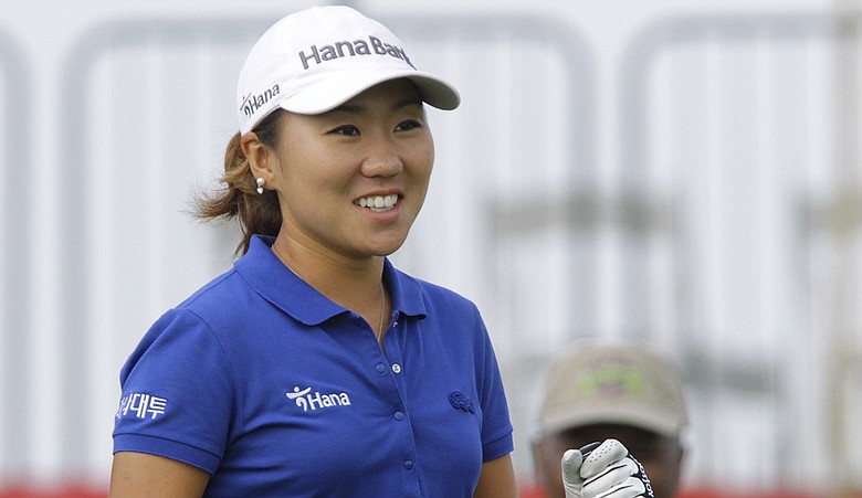 I.K. Kim of South Korea, acknowledges applause from the gallery before teeing off during the second round of the LPGA State Farm Classic.