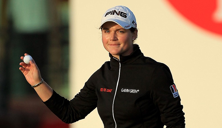 Caroline Masson acknowledges the crowd on the 18th hole during the second round of the 2011 Ricoh Women's British Open at Carnoustie.