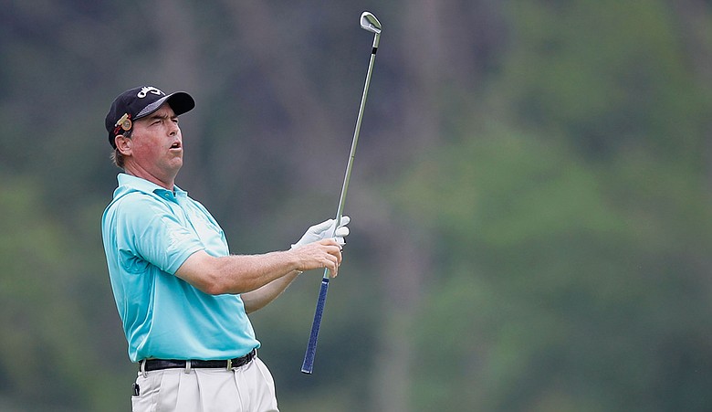 Olin Browne watches his shot from the 13th fairway during the second round of the U.S. Senior Open at the Inverness Club.