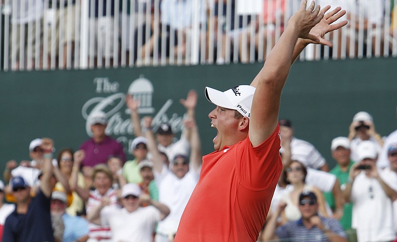 PGA Tour rookie Scott Stallings reacts to winning the Greenbrier Classic, sinking a birdie putt on the first playoff hole to beat Bob Estes and Bill Haas.