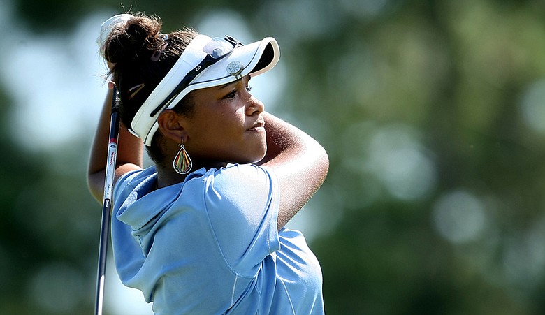 Ginger Howard hits a shot during the first stage of LPGA Q-School.