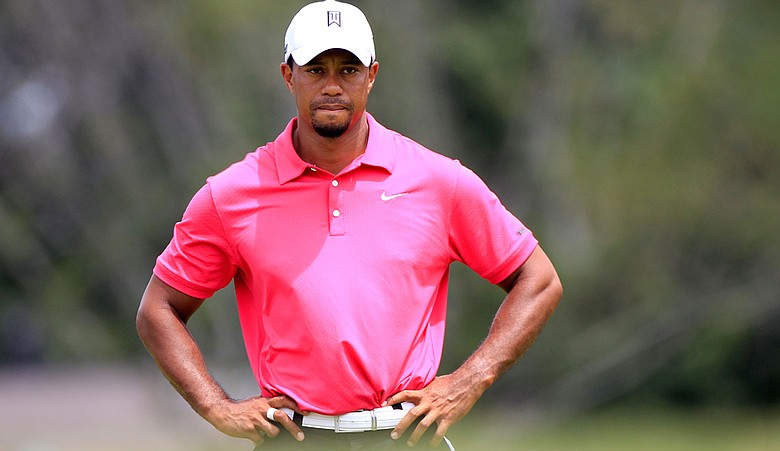 Tiger Woods waits on the eighth green during the first round of the PGA Championship at the Atlanta Athletic Club.