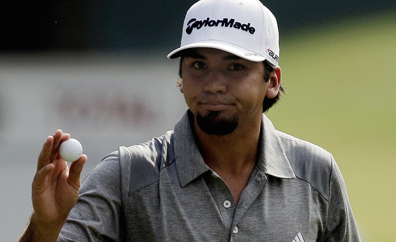 Jason Day, of Australia, reacts after saving par on the 14th hole during the second round of the PGA Championship golf tournament Friday, Aug. 12, 2011, at the Atlanta Athletic Club in Johns Creek, Ga.