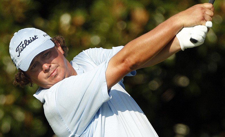 Jason Dufner hits a drive on the ninth hole during the second round of the PGA Championship golf tournament Friday, Aug. 12, 2011, at the Atlanta Athletic Club in Johns Creek, Ga.