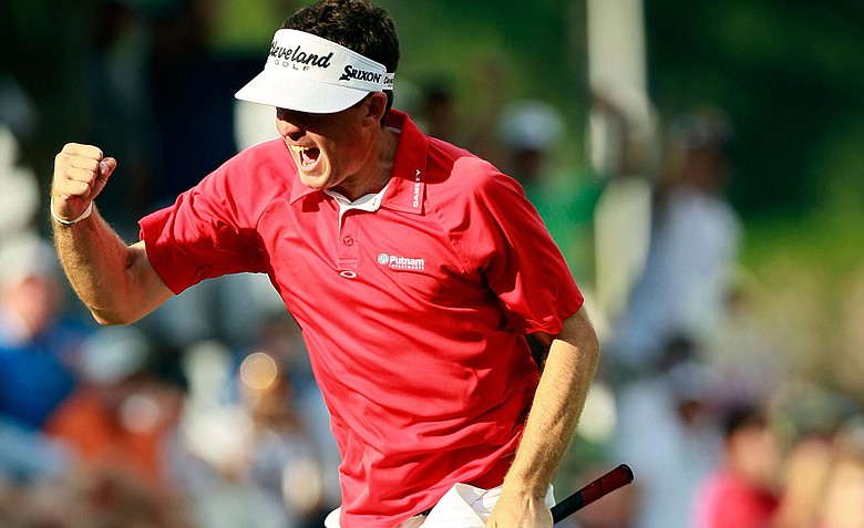 Keegan Bradley celebrates a birdie putt on the 17th green during the final round of the 93rd PGA Championship at the Atlanta Athletic Club on August 14, 2011 in Johns Creek, Georgia.