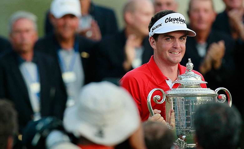 Keegan Bradley poses for photographers with the Wanamaker Trophy after winning a three-hole playoff over Jason Dufner during the final round of the 93rd PGA Championship at the Atlanta Athletic Club on August 14, 2011 in Johns Creek, Georgia.