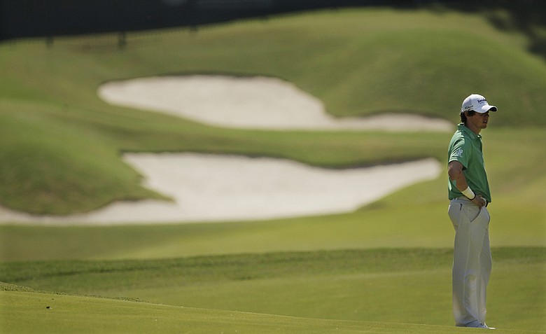 Rory McIlroy, of Northern Ireland, waits to hit on the 11th hole during the final round of the PGA Championship golf tournament Sunday, Aug. 14, 2011, at the Atlanta Athletic Club in Johns Creek, Ga.