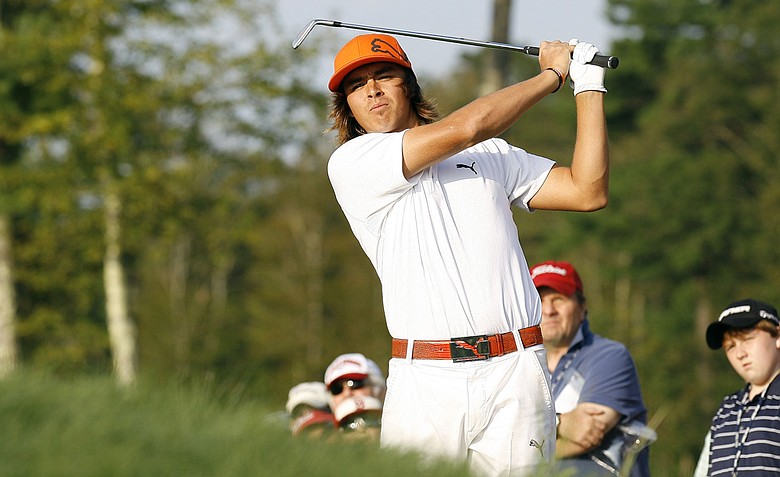 Rickie Fowler hits his second shot on the second hole during the second round of the Deutsche Bank Championship golf tournament at TPC Boston, Saturday, Sept. 3, 2011, in Norton, Mass.