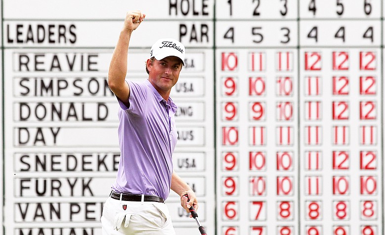 Webb Simpson reacts after he made a putt for birdie on the 18th hole during the final round of the Deutsche Bank Championship at TPC Boston on September 5, 2011 in Norton, Massachusetts. Simpson would make another birdie at 18 in the first hole of a playoff, followed by a dramatic birdie on the second playoff hole to win the title.